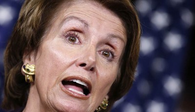 
              FILE - In this Sept. 13, 2012 file photo, House Minority Leader Nancy Pelosi of Calif speaks during a news conference on Capitol Hill in Washington. With Election Day less than six week